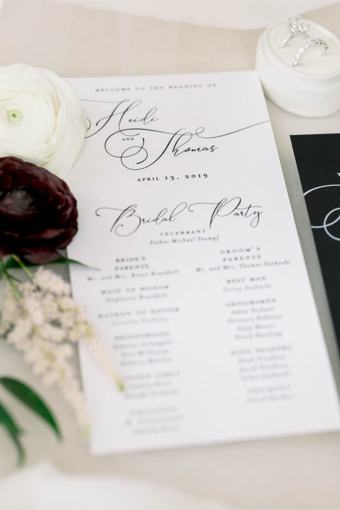 Flowing script danced across the invitations letting their guests know this was a formal wedding with a fun reception waiting for them at the Carnegie Music Hall.  An all black invitation with white text stood out against their white enclosure cards, creating a modern vibe their guests will never forget.